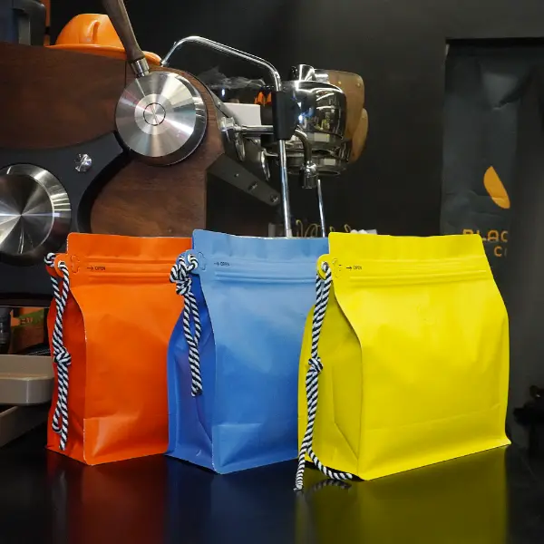500Bustine da caffè G Stock con cordino nei colori arancione, blu e giallo