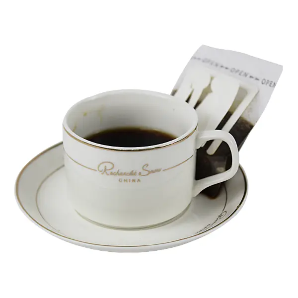 Pouring hot water through drip coffee filter while brewing