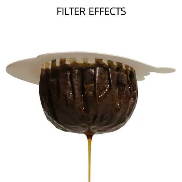 Estrazione del filtro per caffè a goccia UFO di Natale