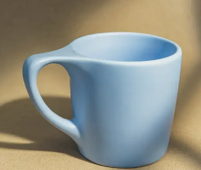 Progettazione della tazza in ceramica per caffè